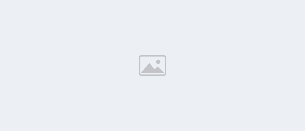 Photo placeholder - replace with plumber working under a kitchen sink