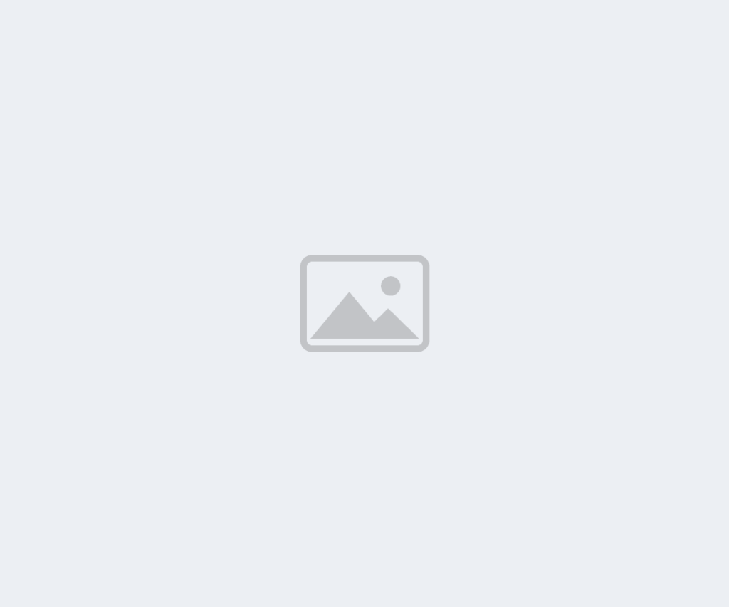 Photo placeholder - replace with plumber at work in a kitchen
